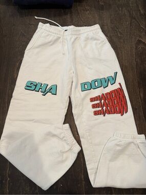 Shadow Hill White Sweatpants with Teal and Red Graphics